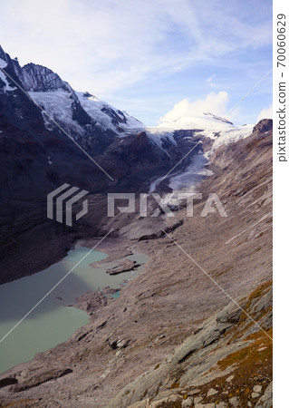 Nice view of Mount Grossglockner and melting glacier in Austria. Nice view of Mount Grossglockner and melting glacier in Austria. 70060629