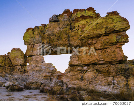 Stunning sunset at the famous rock formation called "La Fenetre", Isalo National Park, Madagascar 70063037