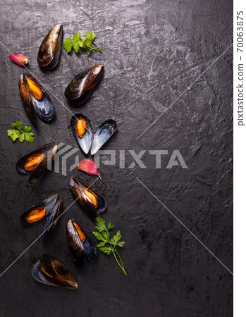 Boiled mussels on dark background with copy space 70063875