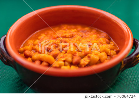 Homemade bread gnocchi with pomodoro and red beans sauce (Traditional dish of Umbria) 70064724