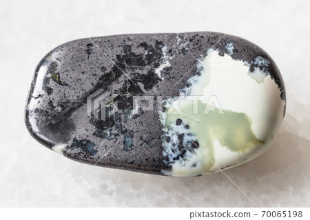 polished Teisky Jade (Hantigyrite) rock on white 70065198