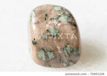 polished Nunderite (Nundorite) on white marble 70065206