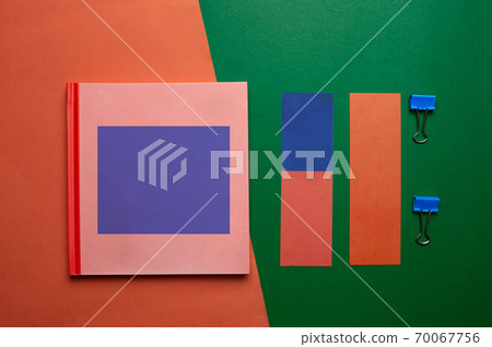 colorful pink blue red notebook paper and clip in retro style business green orange background colorful pink blue red notebook paper and clip in retro style business green orange background 70067756