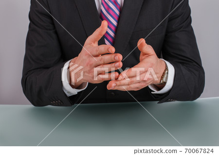 Businessman or politician giving inteview. Businessman or politician giving inteview. 70067824