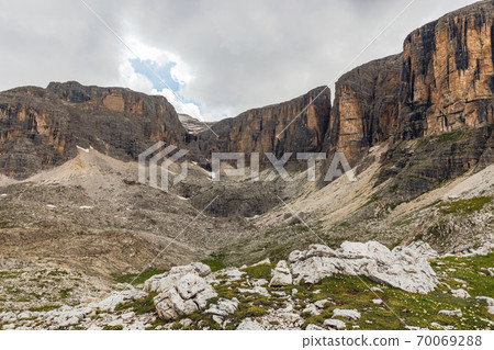 Mountain top view near the Lake of Boe in Italian Dolomites mountains in Alta Badia Mountain top view near the Lake of Boe in Italian Dolomites mountains in Alta Badia 70069288