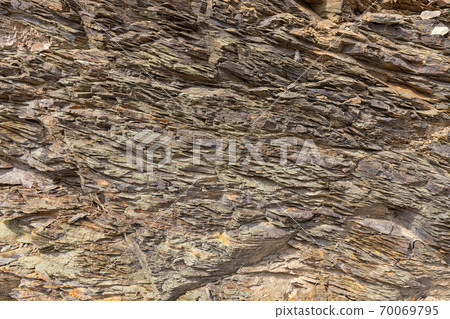 Natural volcanic stone texture. Rock texture and background. Natural volcanic stone texture. Rock texture and background. 70069795