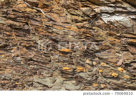 Natural volcanic stone texture. Rock texture and background. 70069810