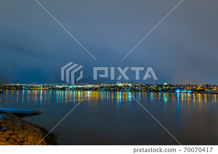 Night photo of Reykjavik city beach. Waterfront lights 70070417