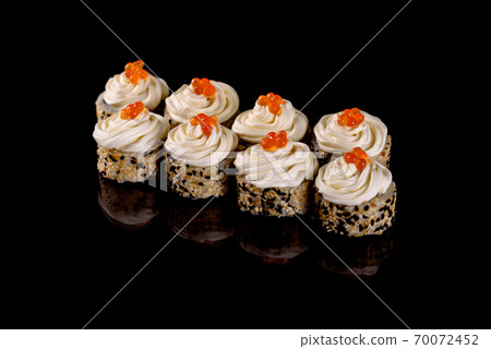 Fresh delicious beautiful sushi rolls on a dark background 70072452