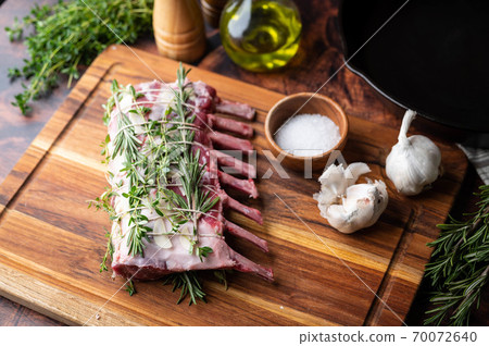 tied lamb rack with herbs for roast 70072640