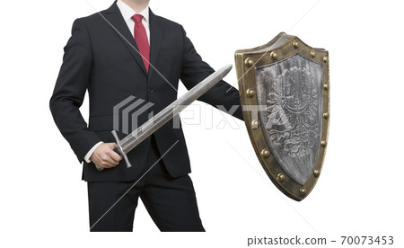 Businessman with sword and shield isolated on white background with clipping path. Business protection concept. 70073453