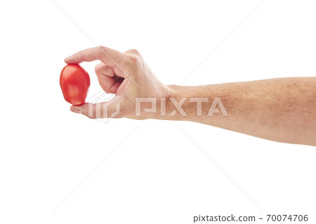 Cherry tomatoes isolated on white with male hand 70074706