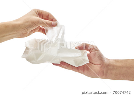 Man cleaning his hand with wet tissue isolated on white background 70074742