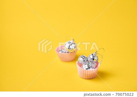 Muffin with disco balls and chef hand. Nightlife in retro style. 90s fashion 70075022