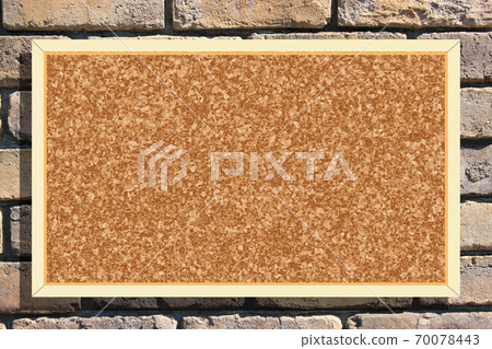Cork-shaped bulletin board attached to bricks 70078443