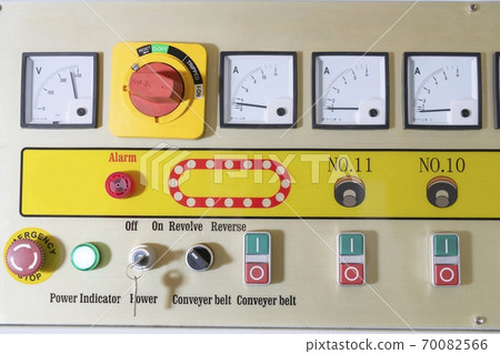 Control panel with various switches and displays 70082566