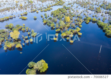 Scenic aerial view of high water in spring time Scenic aerial view of high water in spring time 70086527