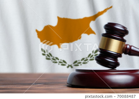 Justice and court concept in Republic of Cyprus. Judge hammer on a flag background Justice and court concept in Republic of Cyprus. Judge hammer on a flag background 70088487