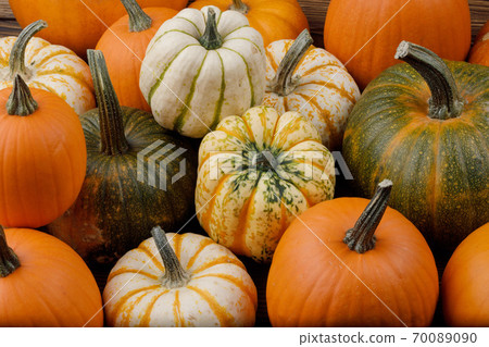 Assortiment of pumpkins background 70089090