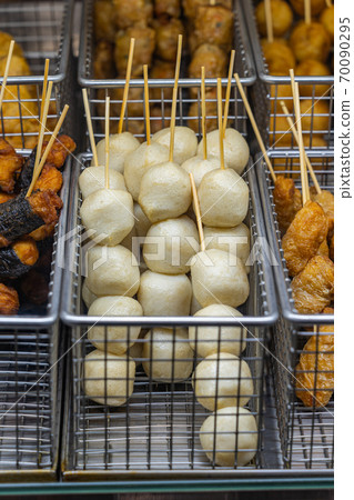 Assorted fish ball skewers at Hong Kong street food market Assorted fish ball skewers at Hong Kong street food market 70090295