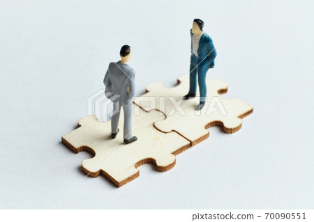 The concept of colleagues at work with teamwork The concept of colleagues at work with teamwork 70090551