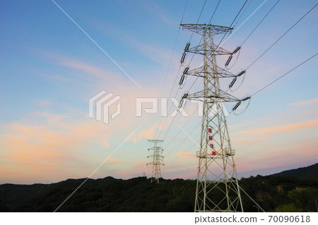 Power transmission tower at dusk Power transmission tower at dusk 70090618