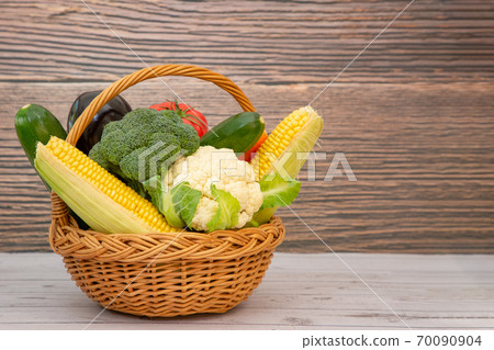 Group Healthy fresh fruit and vegetable in a wooden basket Group Healthy fresh fruit and vegetable in a wooden basket 70090904