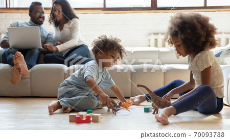 Happy family enjoying free weekend leisure time at home. 70093788