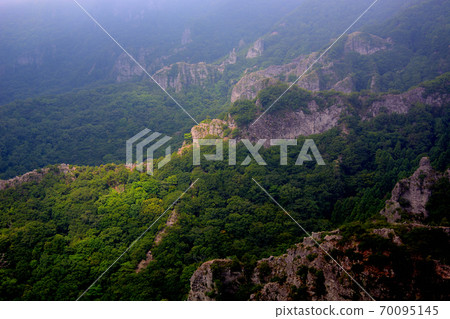 Image of steep strange rocks and cliffs overlooking from the second observatory of Kankakei Ropeway Sancho Station, Shodoshima, Kagawa Prefecture (2) Image of steep strange rocks and cliffs overlooking from the second observatory of Kankakei Ropeway Sancho Station, Shodoshima, Kagawa Prefecture (2) 70095145