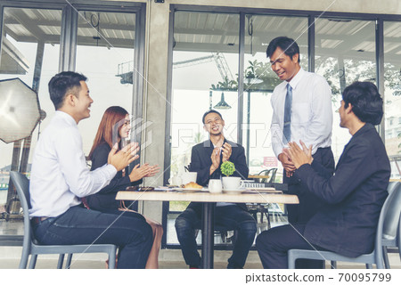 Group of business people meeting in conference room brainstorming consult business document graph Group of business people meeting in conference room brainstorming consult business document graph 70095799
