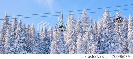 Banner, ski lift and snow trees in winter resort Banner, ski lift and snow trees in winter resort 70096079