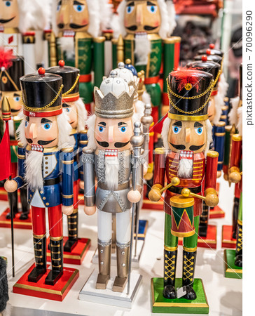 Colorful nutcracker figures at a traditional Christmas market for holiday decoration 70096290