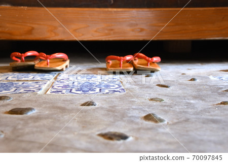 Geta at the entrance of the inn Geta at the entrance of the inn 70097845