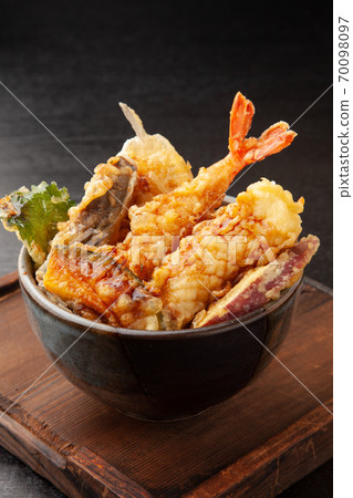 Bowl of rice and fried fish 70098097