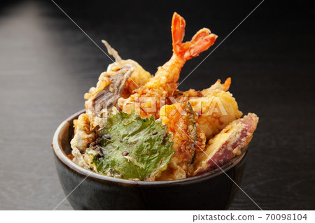 Bowl of rice and fried fish 70098104