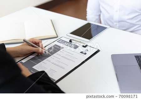 Managers or HR departments read resume and interview applicants for selection as a company real estate agent, Employment and selection of new staff representatives concept. 70098171