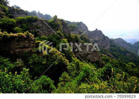 Image of steep rocks and cliffs connected to the stratus seen from Kankakei Ropeway Observatory, Shodoshima, Kagawa Prefecture (4) 70099029