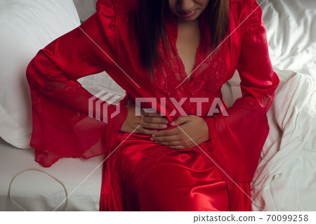 Menstruation pain 70099258