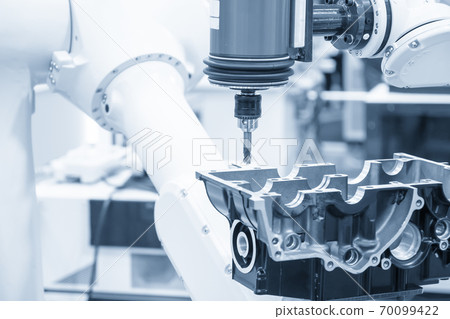 The milling spindle attached on the robotic arm . The milling spindle attached on the robotic arm . 70099422