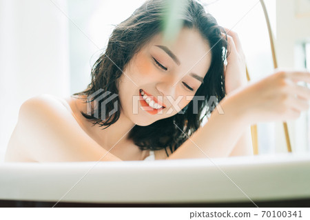 Woman in bath Woman in bath 70100341