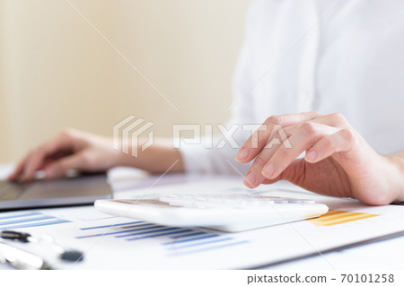 Accounting businessmen are calculating income-expenditure and analyzing real estate investment data, Financial and tax systems concept. 70101258