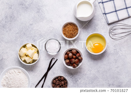 Ingredients for baking - flour, milk, salt, sugar, eggs. Ingredients for baking - flour, milk, salt, sugar, eggs. 70101827