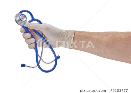 Hand in medical gloves holding stethoscope isolated on white Hand in medical gloves holding stethoscope isolated on white 70103777