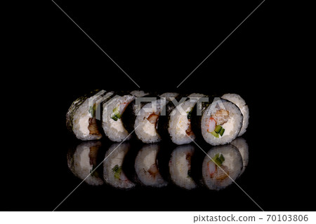 Fresh delicious beautiful sushi rolls on a dark background Fresh delicious beautiful sushi rolls on a dark background 70103806