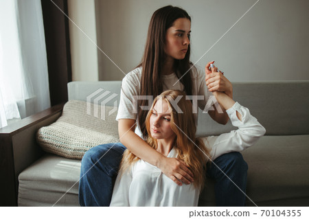 Girlfriends in love sharing time together indoors 70104355