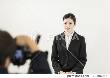 Job hunting for women in recruitment suits shooting in a photo studio 70106014