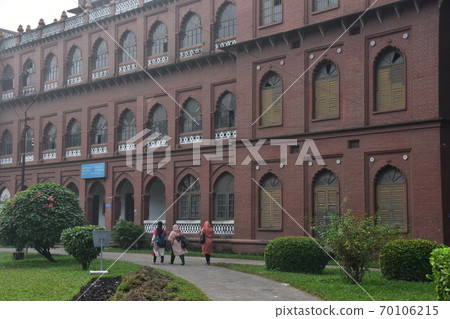 Dhaka, the capital of Bangladesh, a historic building, Curzon Hall, a Muslim schoolgirl heading to the university Dhaka, the capital of Bangladesh, a historic building, Curzon Hall, a Muslim schoolgirl heading to the university 70106215