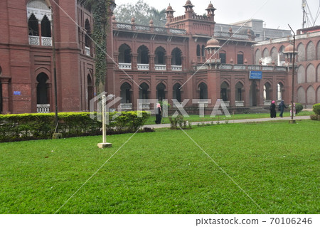 Dhaka, the capital of Bangladesh, a historic building, Curzon Hall, a Muslim woman taking a walk in the morning Dhaka, the capital of Bangladesh, a historic building, Curzon Hall, a Muslim woman taking a walk in the morning 70106246