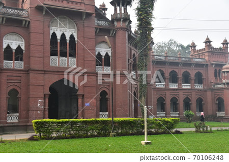 Dhaka, the capital of Bangladesh, a historic building, Curzon Hall, a Muslim woman taking a walk in the morning Dhaka, the capital of Bangladesh, a historic building, Curzon Hall, a Muslim woman taking a walk in the morning 70106248