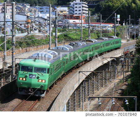 Series 117 train running near Yamashina Station on the Kosei Line 70107840